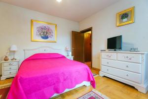 Postel nebo postele na pokoji v ubytování Casa Natalia
