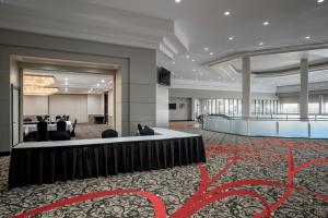 a rendering of the lobby of a hotel at Delta Hotels by Marriott Regina in Regina