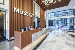 a moxaz store in a shopping mall with a lobby at Mossaz Suites by Mana Mana in Petaling Jaya +141 photos