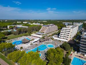an aerial view of a resort with a swimming pool at Aparthotel Holiday in Bibione