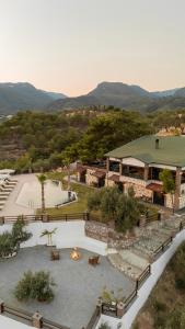 an aerial view of a courtyard with a fire pit at Kaira Kazdaglari in Edremit