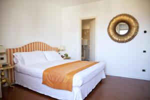 Кровать или кровати в номере Hotel Iva +63 фотографии