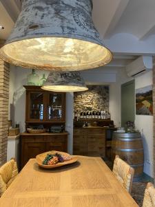 a kitchen with a table with a plate of food on it at L' Alzina in Falset