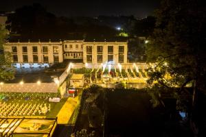 a view of a building at night at Gemini Continental, Hazratganj in Lucknow