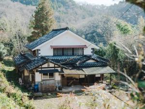 a house on top of a mountain at 里の宿 門後藤 in Taketa