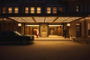 a car parked in front of a building at night at Imperial Hotel, Kyoto in Kyoto