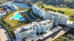 an aerial view of an apartment complex with a swimming pool at Solana Village in Málaga