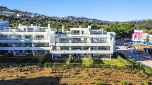 an aerial view of a large white building at Solana Village in Málaga