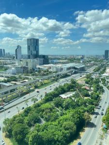 an aerial view of a city with a highway at Supalai Park Srinakarin Penthouse in Ban Nong Chaeng
