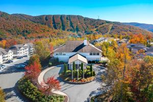 an aerial view of a house in the mountains at Vacation Village in the Berkshires in Hancock