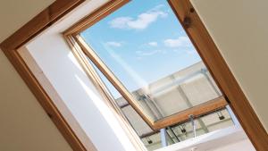 a window with a view of the sky at Boryeong (Daecheon) Jeil Pension in Boryeong