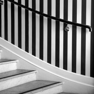a set of stairs with black and white stripes at Hotel Aria in Nice +38 photos