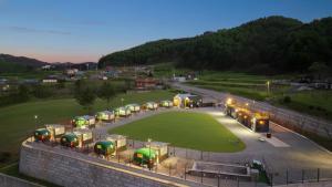 a group of trucks parked in a parking lot at Yangyang Lira Camp in Yangyang +10 photos