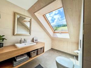 a bathroom with a sink and a window at Apartment Kinast - HFT202 by Interhome in Hofstetten