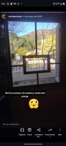 a website with a smiley face in front of a window at Wilka pirul in San Marcos Sierras