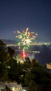 a firework display over the water at night at Villa San Vito Amalfi Coast A timeless charm in Vietri sul Mare