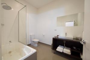 Vannituba majutusasutuses Ikon Hotel