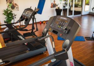 a gym with two tread machines on a treadmill at Villa del Rio Express in Valdivia