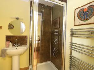 a bathroom with a shower and a sink at 78 Findhorn in Forres +29 photos