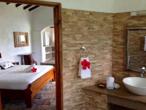 Uma cama ou camas num quarto em Lazare Picault Hotel