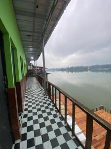 a dock with a view of a body of water at WD adventure Pangalengan in Palayangan