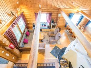an overhead view of a living room in a log cabin at Holiday Home Keisarintupa by Interhome in Ruka