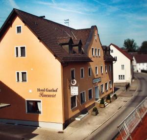 a model of a building on a street at Hotel Gasthof Rosenwirt in Au in der Hallertau