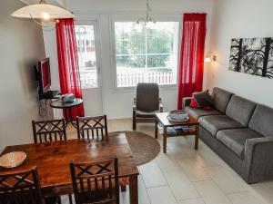 a living room with a couch and a table at Holiday Home Levi star 2- as- 409 by Interhome in Levi
