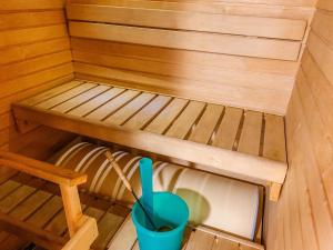 an overhead view of a sauna with a bucket at Holiday Home Levi star 1503 by Interhome in Levi