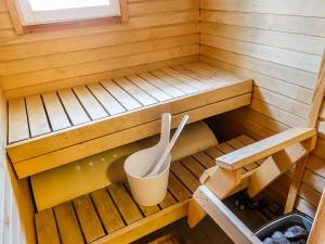 an inside view of a sauna with a plastic spoon at Holiday Home Moonlight 201 by Interhome in Levi