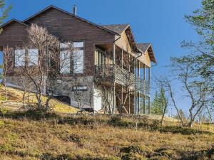 a house on top of a hill at Holiday Home Karhu b by Interhome in Saariselka