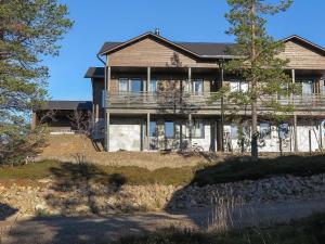 a large house on top of a hill at Holiday Home Karhu b by Interhome in Saariselka