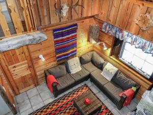 an overhead view of a living room with a couch at Holiday Home Kantapää c 3 by Interhome in Luosto +15 photos