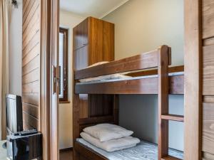 a bunk bed room with two bunk beds at Holiday Home Villa ylläs 201 by Interhome in Ylläs +11 photos