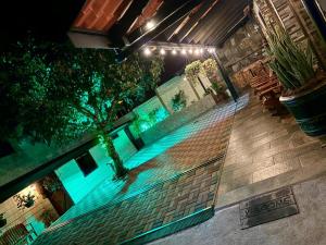 an overhead view of a swimming pool at night at Cabañas Tierra Fértil #2 in Montaña