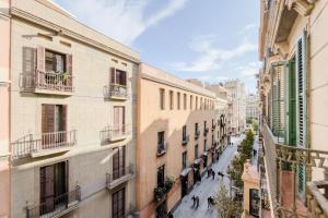 a view of a city street with buildings at Palau de la Musica Apartments in Barcelona