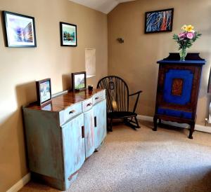 a room with a desk and a chair and a table at Horse & Farrier Pub in Dacre