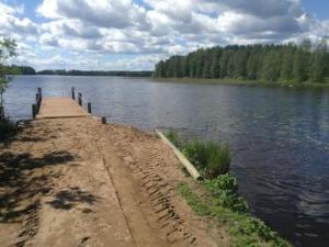 a path leading into a large body of water at Holiday Home Jokela by Interhome in Horonkylä