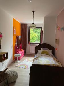 a bedroom with a bed and a window at Gastwerk Waldfrieden in Gießen +45 photos