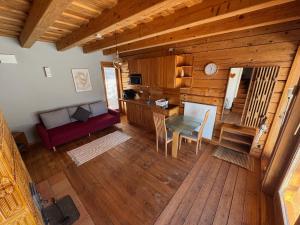 an overhead view of a living room with a table at Frida Farm Vendégház in Kétvölgy