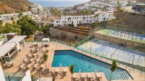 an aerial view of a swimming pool in a resort at Sunset Suites by Bull Hotels in Puerto Rico de Gran Canaria