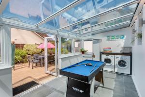 a kitchen with a pool table in a house at 3 Bed in Braunton oc-b29581 in Braunton