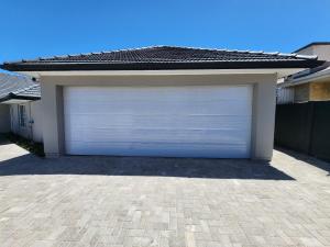 a pair of garage doors in a house at Wagenaar Villas in Monte Vista +4 photos