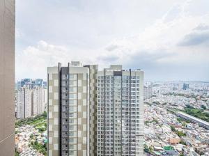 a view of a tall building in a city at SG lusxury city in Ho Chi Minh City