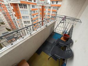 a view of a balcony of a building at 1 Camera Dubla Valea Trandafirilor in Chişinău