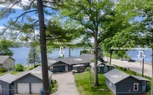 an aerial view of a house with a basketball hoop at Lakeside Getaway with Dock, Firepit, Grill in Newaygo