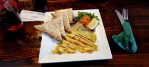 a white plate of food with bread and toast at Gordon Arms Hotel in West Linton +19 photos