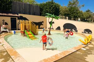 a group of children playing in a water park at Ludocamping in Lussas +89 photos