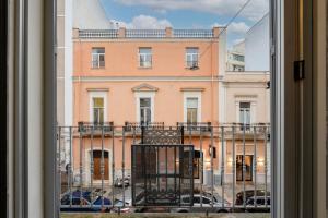 a view of a building from a window at Dimora Delle Stelle - Design & Heritage in Bari