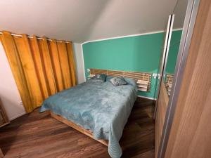 a bedroom with a bed in a room at Attico Vicky in Porto Azzurro